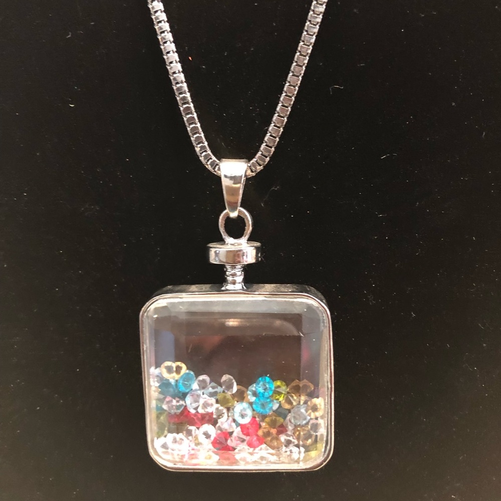Crystal stones in a jar necklace